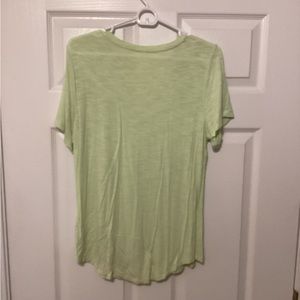 Lime green V neck.